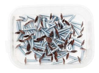 Wall Mural - A container of screws with a few brown ones