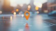 © wanna - Photo of a pin on a map representing a location, with focus on an orange marker point. Web banner with copy space on the left side, blurred background.
