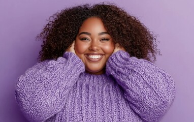 Wall Mural - Plump woman with a joyful expression, cozy sweater, soft purple background