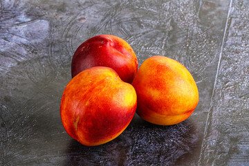 Wall Mural - Ripe sweet juicy fresh red nectarines