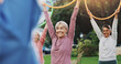 © peopleimages.com - Exercise, senior people and fitness with hoop for physical workout, wellness and rehabilitation. Retirement, coach and group of elderly friends for training, wellbeing and stretching with ring toys