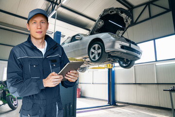 Poster - Serviceman with digital tablet on the background of the car in the car service.