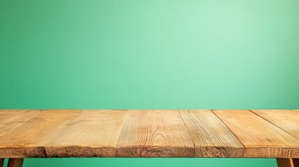 Poster - Wooden table with green background in a natural setting for interior design or decoration