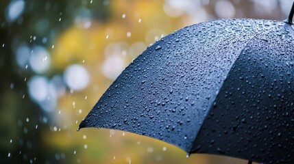 Aufkleber - Rain falls steadily, creating a symphony of droplets on a black umbrella shielding from the elements, evoking a serene atmosphere amidst the drizzling weather