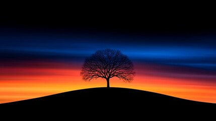 Canvas Print - A lone tree on top of a hill at sunset