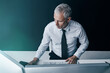 © JamDay/peopleimages.com - Mature man, computer and office for accounting review, digital report and chief financial officer. Reading, company audit and monitor investment revenue, shares value and website for economy trend