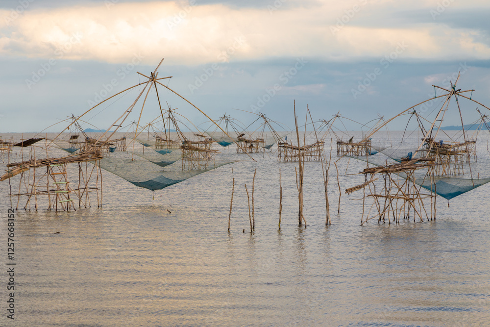 Foto de Stock A giant fish trap or a fish trap is a device used to ...