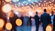 © Ankit - blurred event with people and bokeh lights.