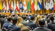 © KP Creative Stock - Global Dialogue: A diverse audience attentively listens to a speaker at a conference hall, with flags of various nations displayed in the background, symbolizing global unity and communication.