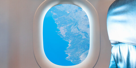 Wall Mural - Passenger airplane is flying over amazing sea as seen through window of an aircraft