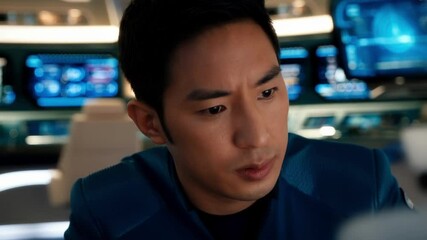 Poster - Focused asian spaceship officer managing control panel, analyzing data on computer screen while communicating inside command bridge of advanced spacecraft