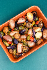 Wall Mural - Mixed roasted vegetables on baking tray.