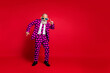 © deagreez - Full length photo of funky aged man amour cupid character role play dancing corporate party wear sun specs hearts pattern suit costume isolated vibrant color background