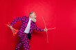 © deagreez - Profile photo of funky crazy aged man guy cupid see nice couple going to shoot love bow arrow wear hearts pattern suit shirt tie pants isolated red color background