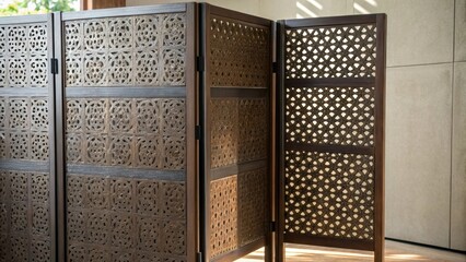 Aufkleber - A medium closeup of two intersecting metal room dividers highlighting their textured surfaces and the play of shadows created by the perforations effectively breaking up an open