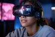 © Milos - A young woman, wearing a virtual reality headset, is fully immersed in a digital experience, highlighting the fusion of technology and human interaction in today's world.