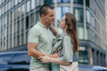 Two tourists having fun on romantic summer vacation in Poland - Holidays and traveling lifestyle concept. Young couple walking street on vacation. Happy couple of travelers enjoying.