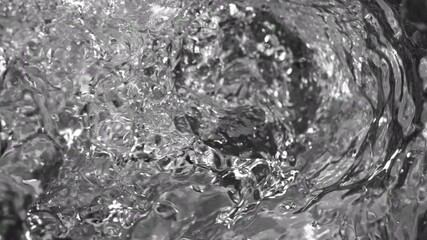 Wall Mural - super slow motion shot of water whirling in glass bottle at 1000fps.