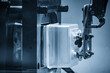© Pixel_B - Close up scene material handling process the food container by robotic system from injection machine.