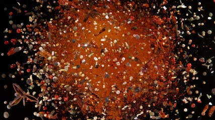 Super Slow Motion Shot Various Spices Mixture Exploding and Rotating Towards Camera at 1000fps.