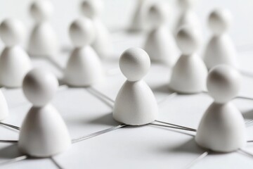 Poster - Group of small white sculptures sitting on a white background
