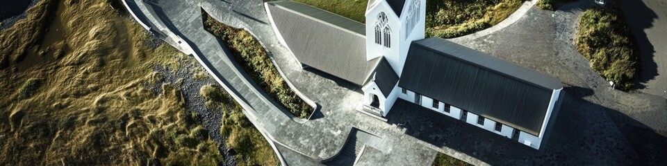 Poster - Aerial view of a road leading up to a building, great for architectural or infrastructure use