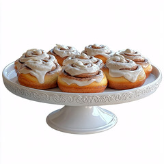 Sticker - Cinnamon rolls with cream cheese frosting, elegantly displayed on a white pedestal cake stand.