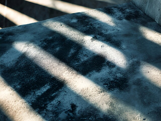 Poster - abstract concrete light: an abstract composition showcasing the play of light and shadow on a textur