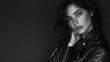 © Mohammed - Monochrome portrait of a woman with captivating gaze, styled in a leather jacket. An evocative black and white image that exudes confidence.