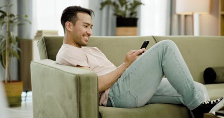 Poster - Man, cellphone and texting laugh on sofa in home for social media joke, funny humor or message. Male person, mobile and smile for communication post or internet connection, comedy streaming or meme