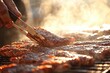 © Alexej - Outdoors, meat is grilled over a barbecue grill with the aroma of grilling filling the air