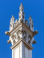 Poster - Elaborate architectural spire against a bright blue sky representing historical craftsmanship : Generative AI