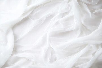 Poster - Soft white fabric draping elegantly across a surface in natural light