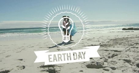 Poster - Earth Day text animation over people walking on sandy beach near ocean