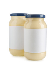 Wall Mural - Tasty mayonnaise sauce in glass jars with blank labels isolated on white