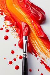 Poster - A closeup view reveals a single brushstroke blending red and yellow paint. The vibrant colors contrast against the clean white background showcasing a splash of creativity.