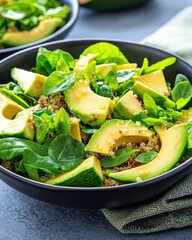 Wall Mural - Fresh Spinach Salad with Avocado and Quinoa in Modern Bowl