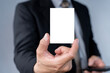 © jittawit.21 - Businessman hand holding blank white business card with copy space for text