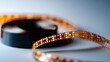 © Nur - Close-up of a Reel of Film: A Glimpse into the Golden Age of Cinema