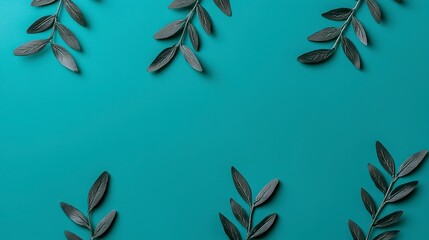 Wall Mural - Green Leaves on Teal Background Creating a Minimalist Aesthetic