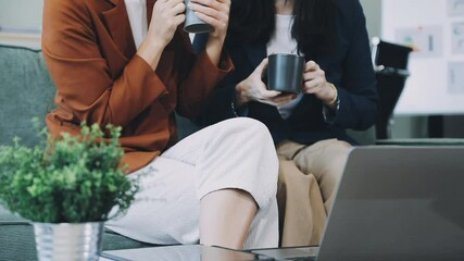 Canvas Print - Business team sitting around table having meeting