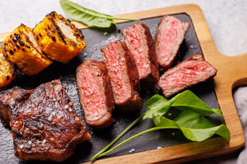 Wall Mural - A perfectly cooked sliced striploin steak with a juicy, tender texture