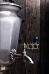 Vintage samovar on wooden background.