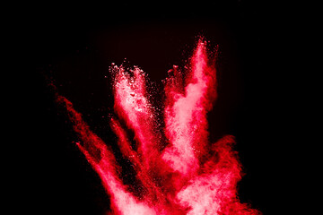 Wall Mural - red cloud of dust is blowing on white backdrop. the dust is red and black in color.