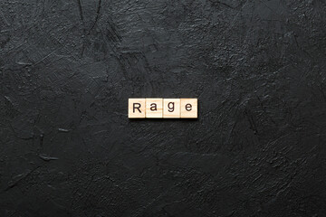 Wall Mural - rage loan word written on wood block. rage loan text on table, concept