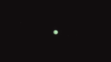 Wall Mural - Planet Jupiter through telescope in real-time with Galilean moons