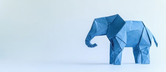 Poster - Blue origami elephant positioned on the right against an isolated white background showcasing vibrant blue tones and intricate folds.