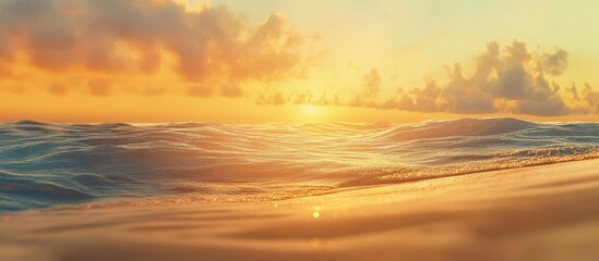 Poster - Serene sunrise over tranquil ocean waves with soft golden hues and pastel clouds reflecting warm light across the horizon in a calm setting