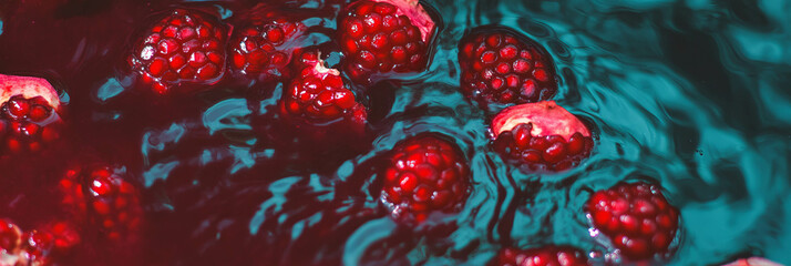 Poster - Dark red milk with pomegranate ripples and seeds creates a captivating visual experience