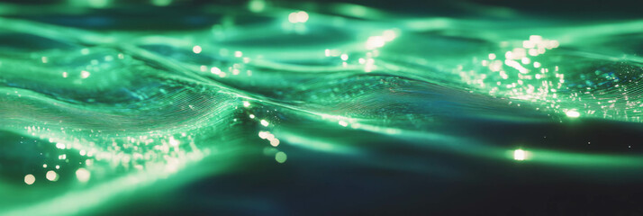 Poster - Rippling green water creating a mesmerizing pattern with bright highlights
